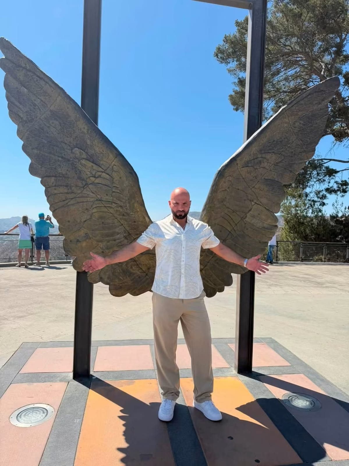 With the angel wings sculpture