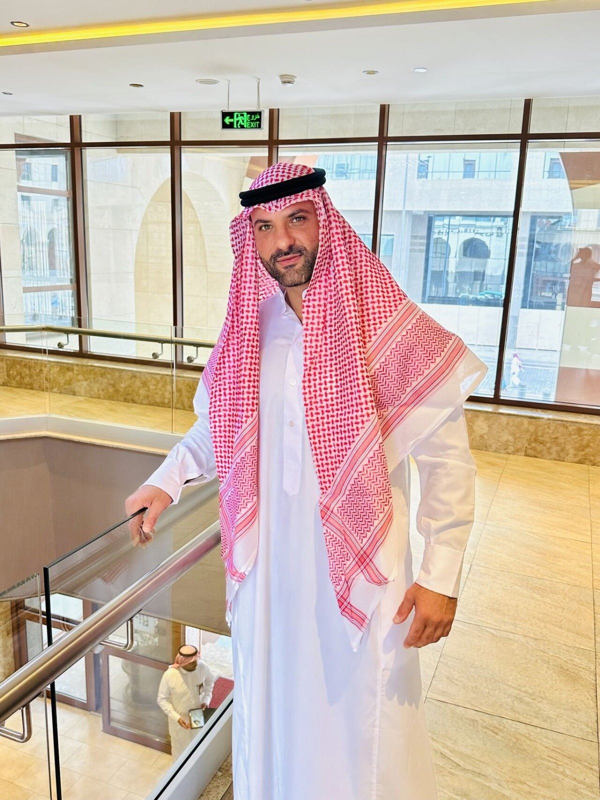 In traditional dress during his travels