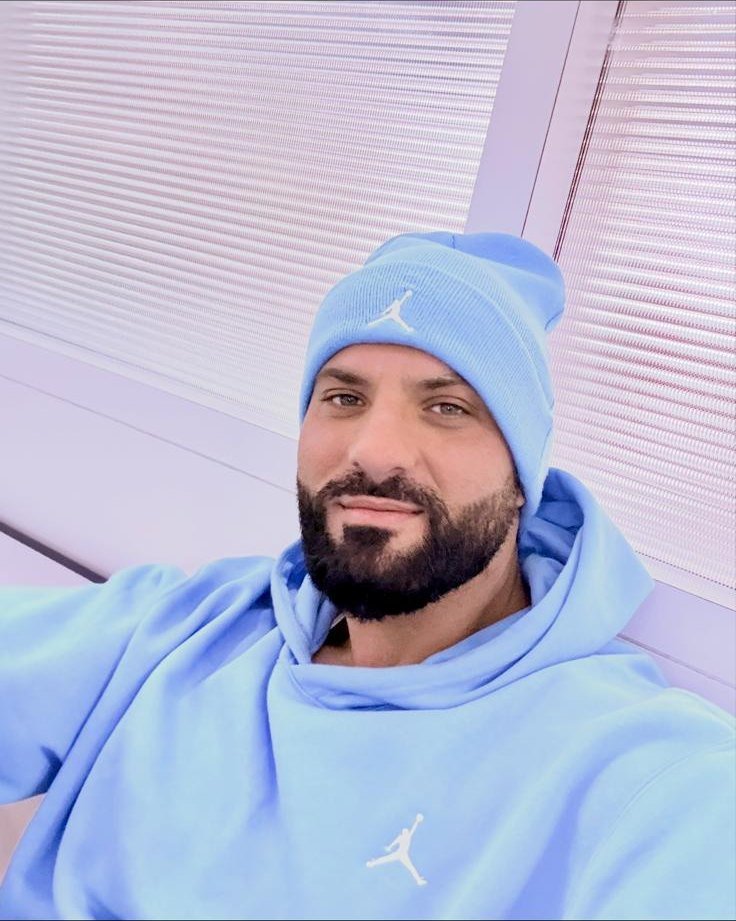 Selfie in a blue hoodie