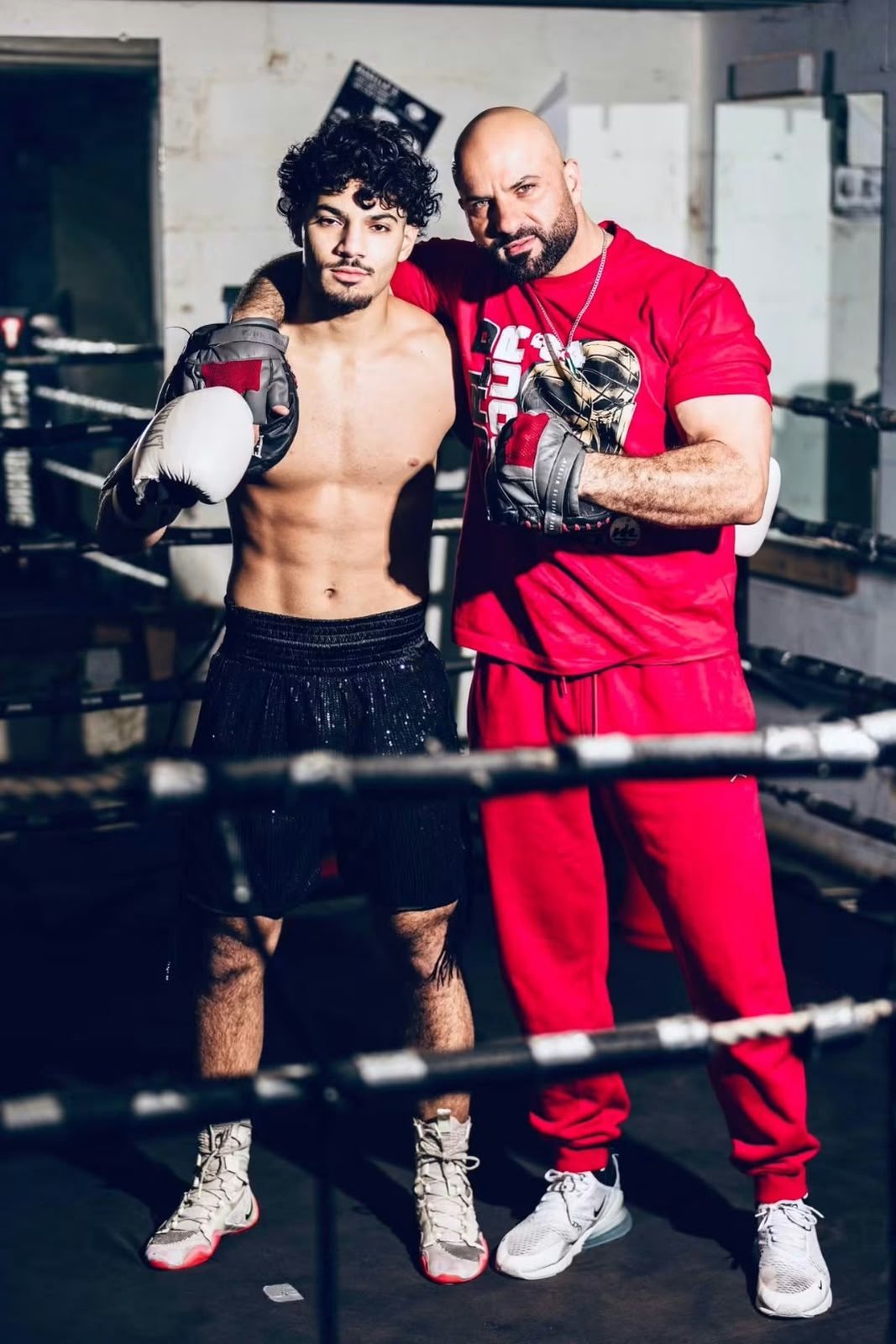 With a young boxer in the ring